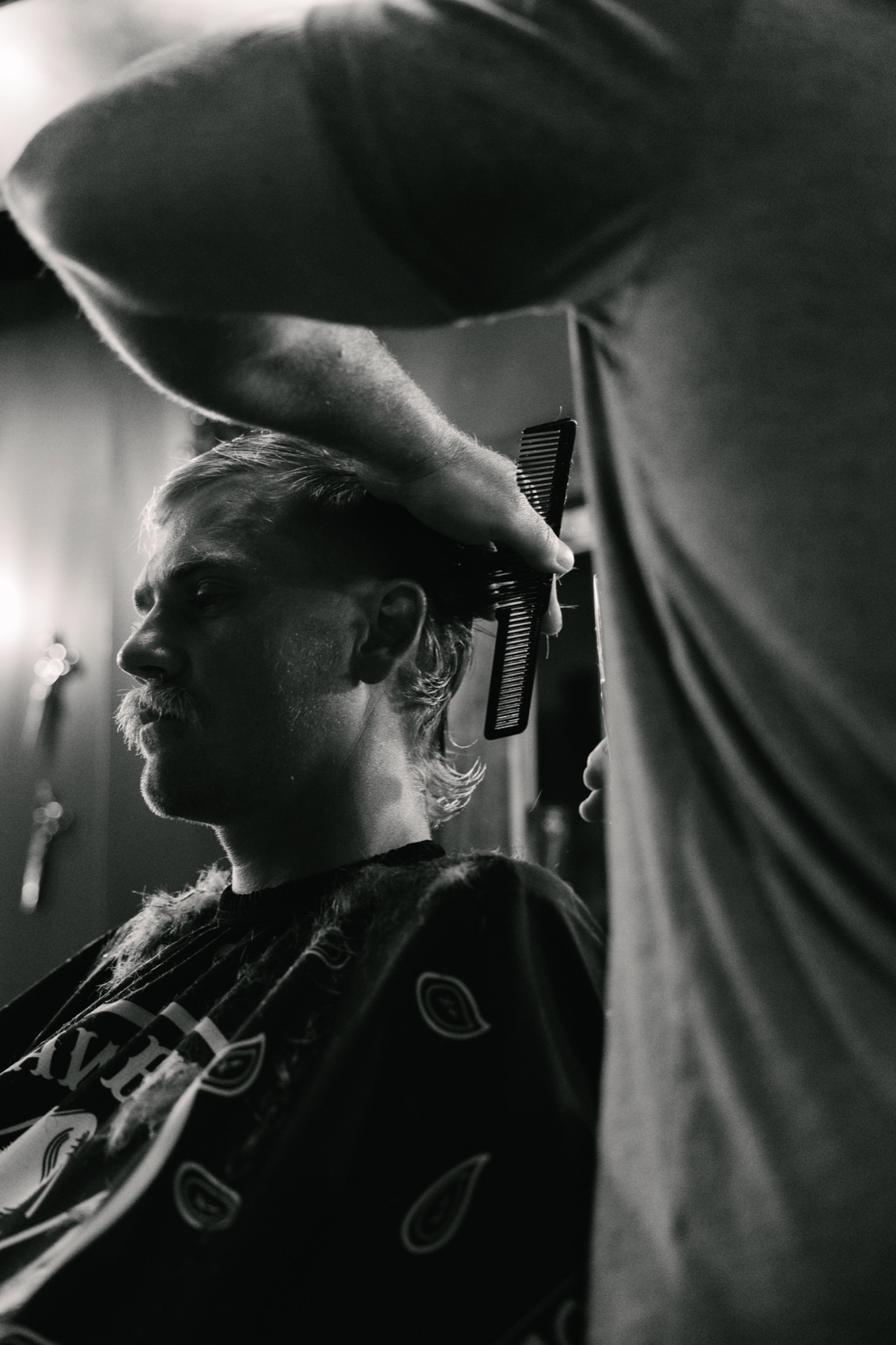 A haircut in progress at Outlaw Barber Company Summerville