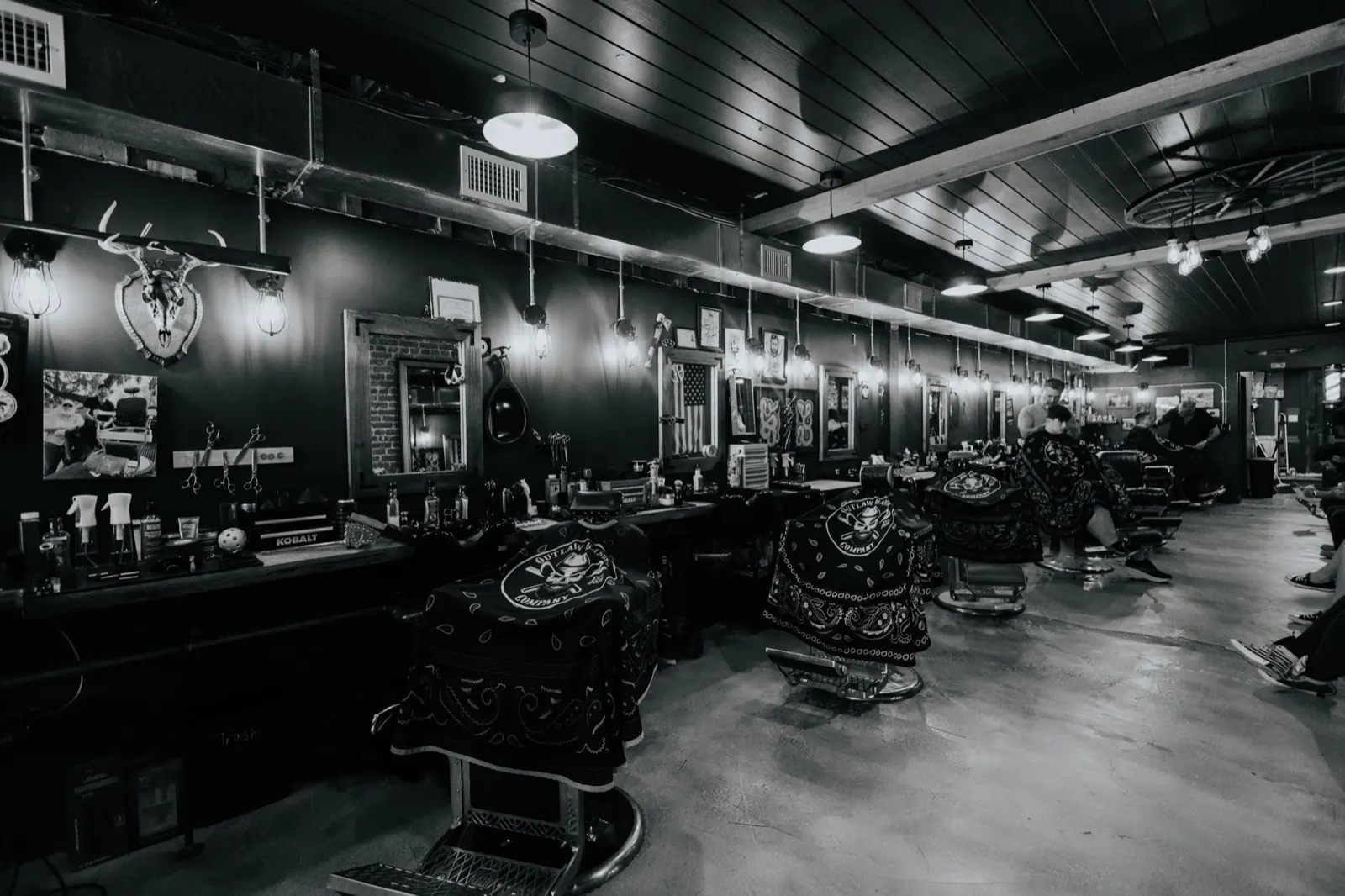 The interior and barber chairs at Outlaw Barber Company Summerville