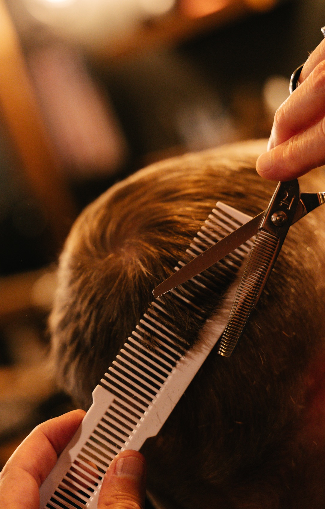 Detailed scissor work at Outlaw Barber Company Summerville